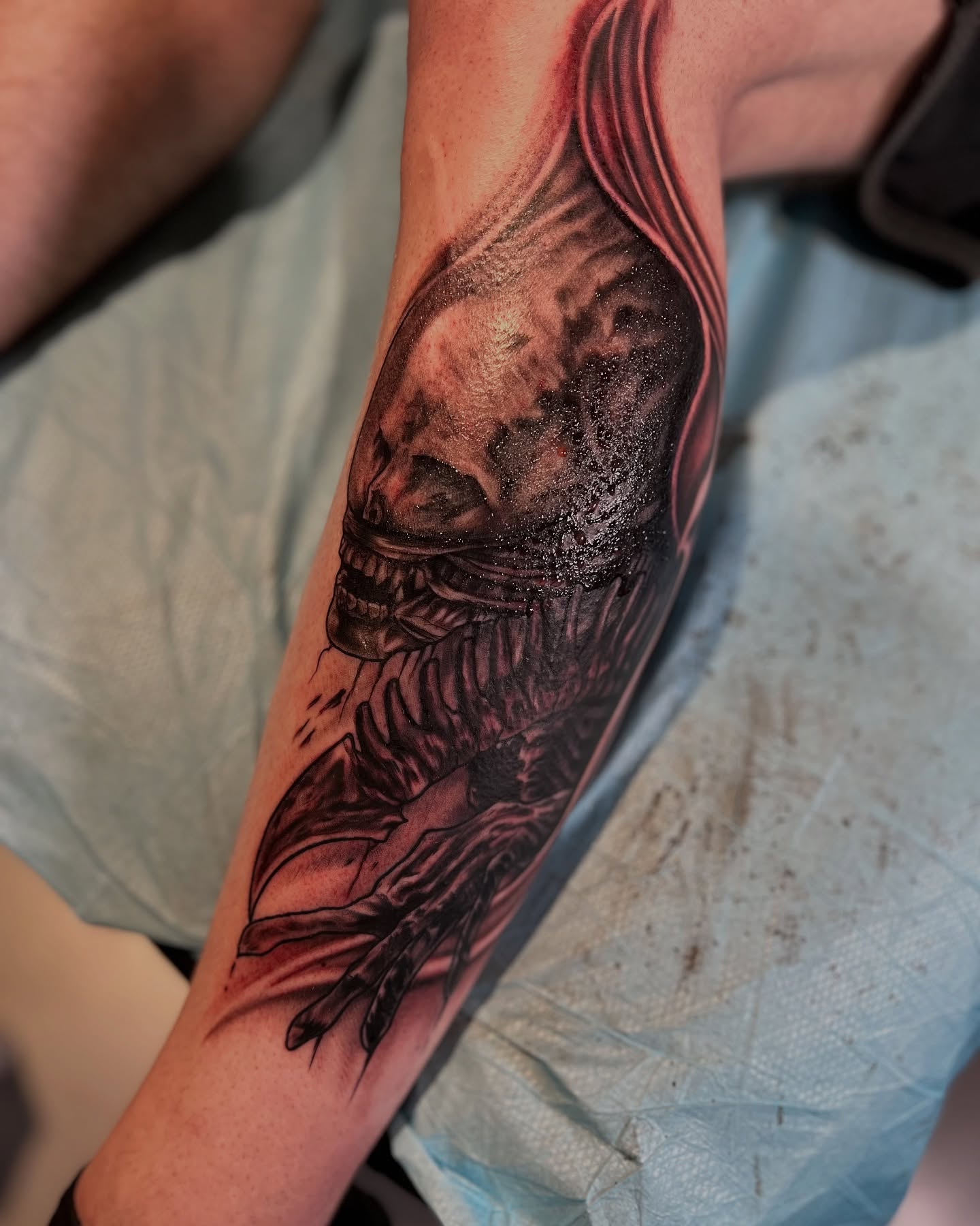 Alien creature dark realism tattoo on the forearm by 𝕭𝖗𝖞𝖈𝖊 𝖂𝖎𝖑𝖑𝖎𝖆𝖒