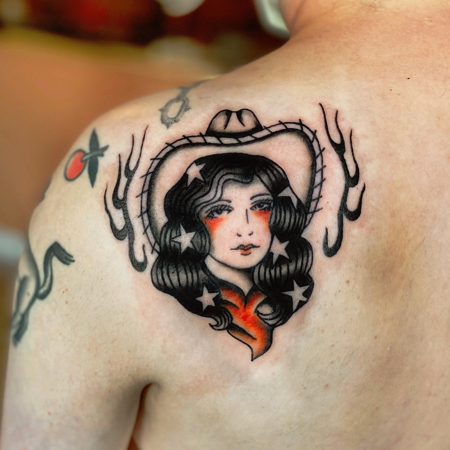 Cowgirl portrait American traditional tattoo on the shoulder by Myka King
