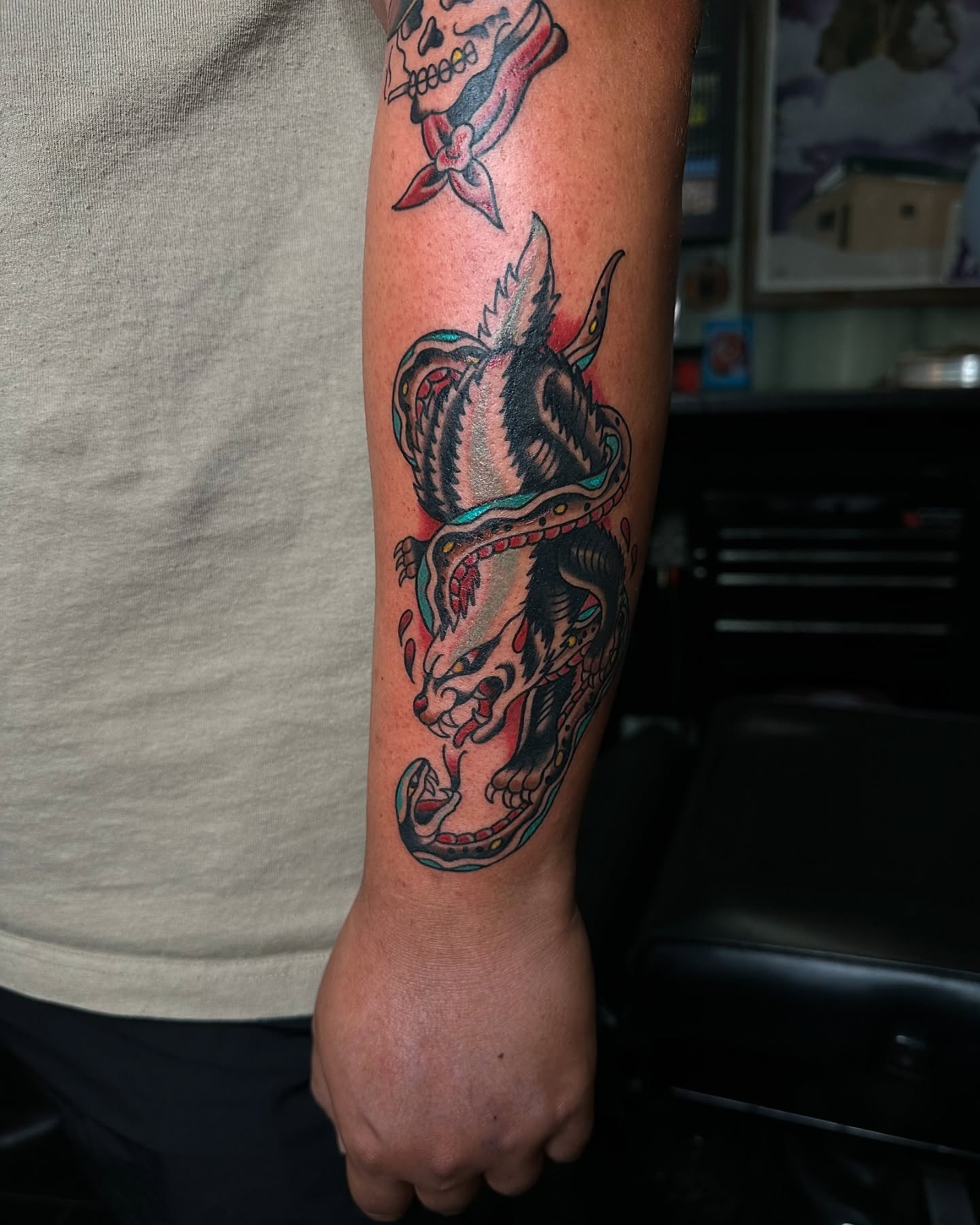 Dragon American traditional tattoo on the forearm by Leo Torres