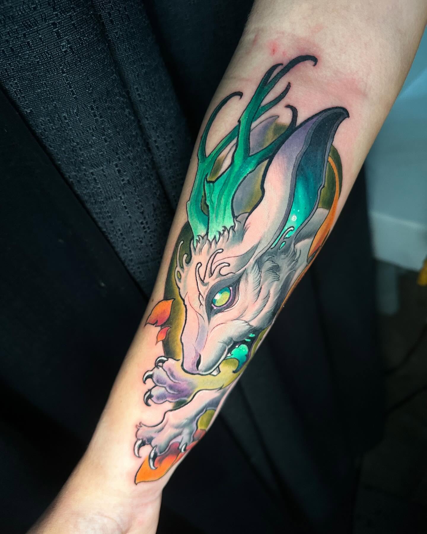 Wolf American traditional tattoo on the forearm by Zoe "Z" Fisk