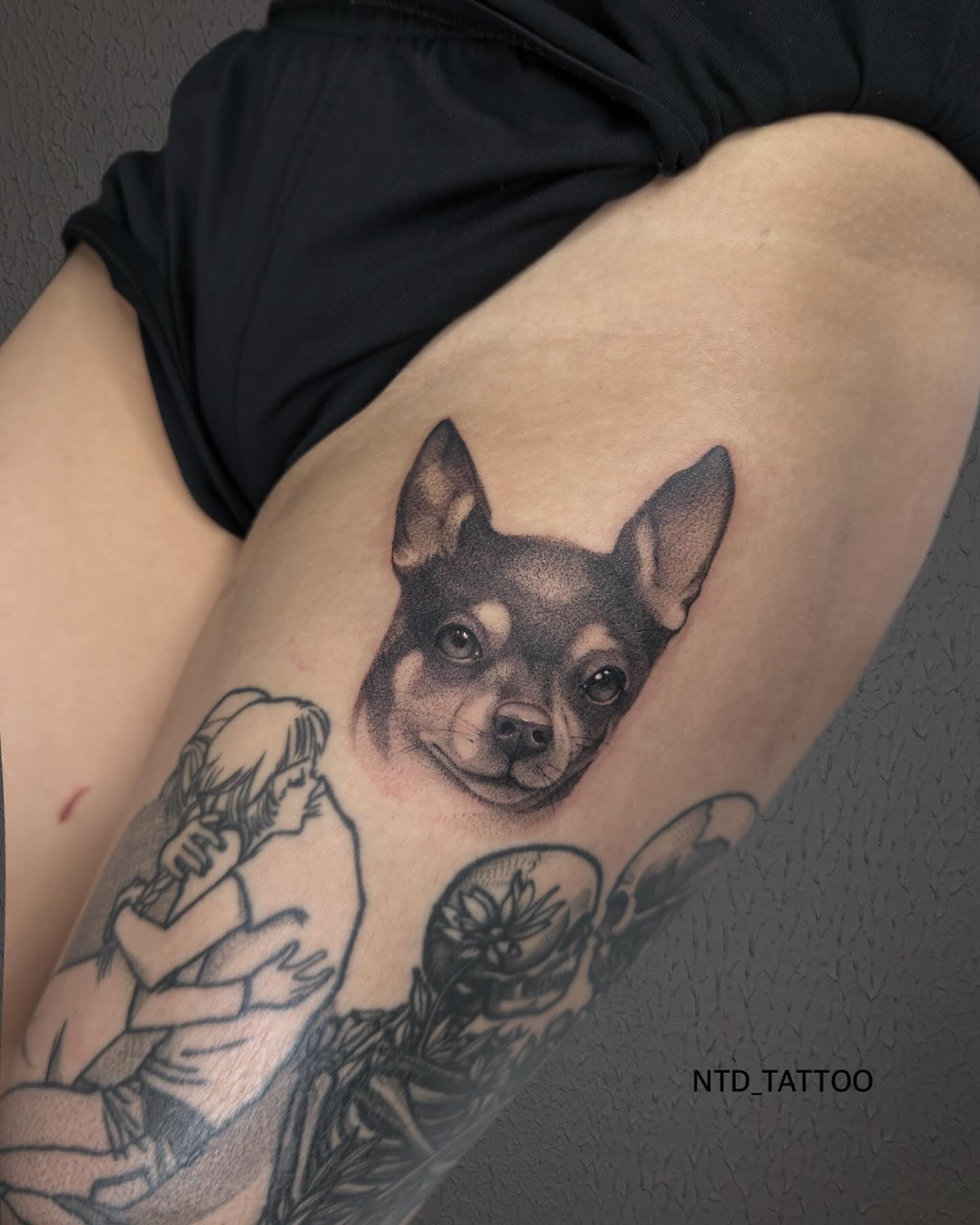 Dog and child realism tattoo on the thigh by Tetiana Maxon