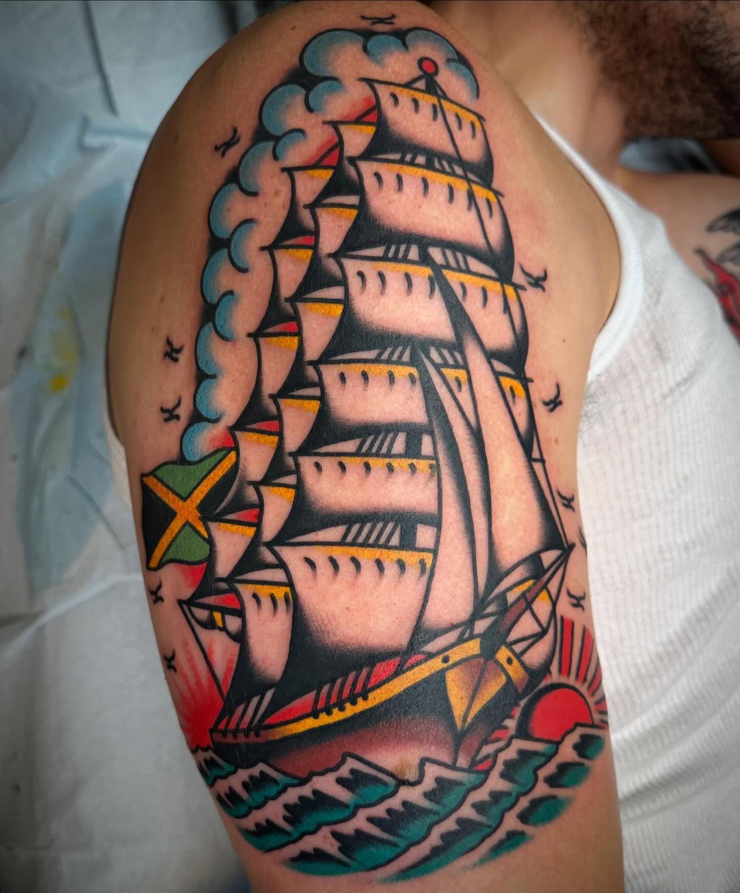 Sailboat American traditional tattoo on the shoulder by Nathan Rohrbacher, Nashville, Tennessee