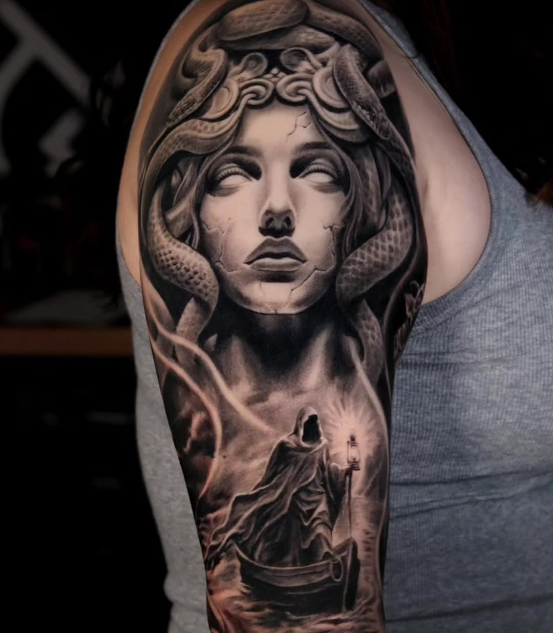 Medusa and Charon in a boat realism tattoo on the forearm by Brandon Rabago, Fort Worth, Texas
