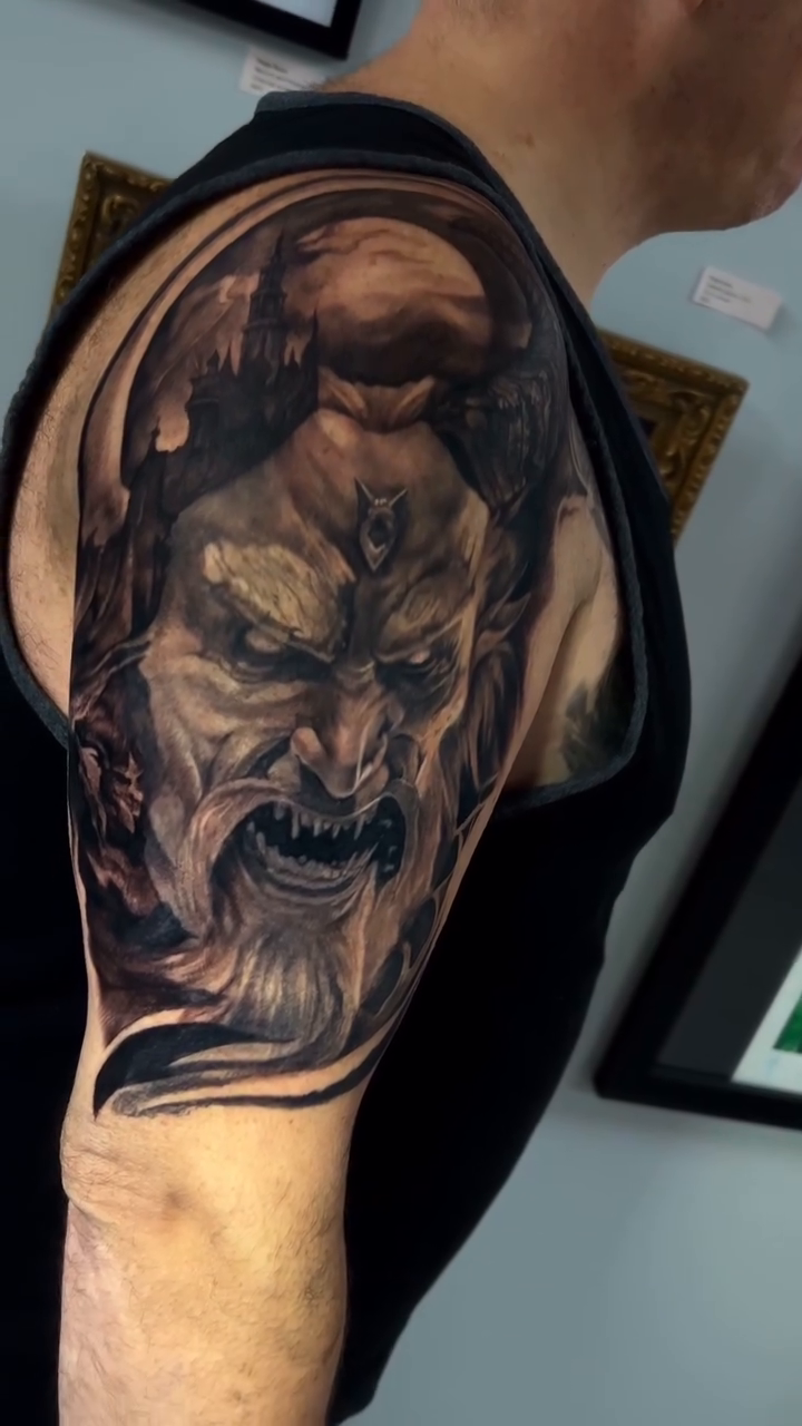Tattoo by @the_buza — dark_realism, black_and_grey