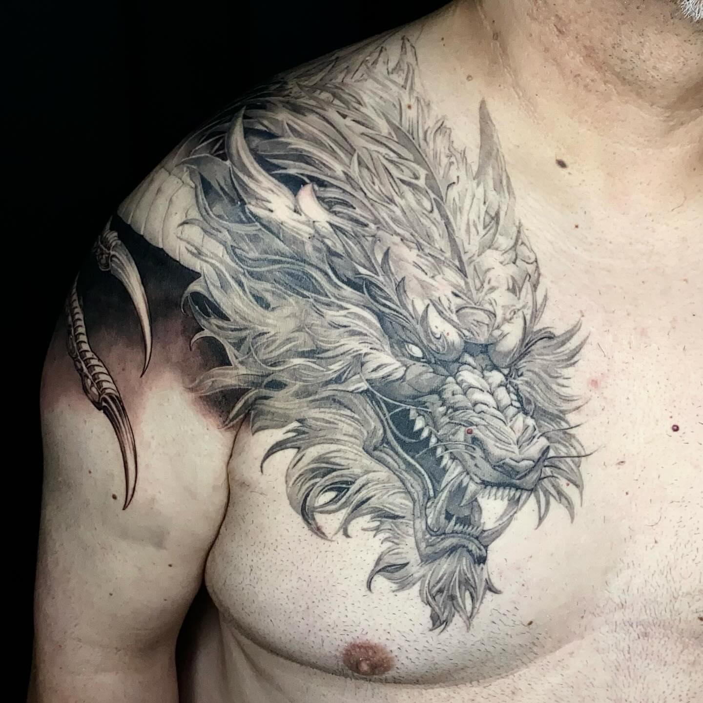 Tattoo by @brawdertattoo — black_and_grey
