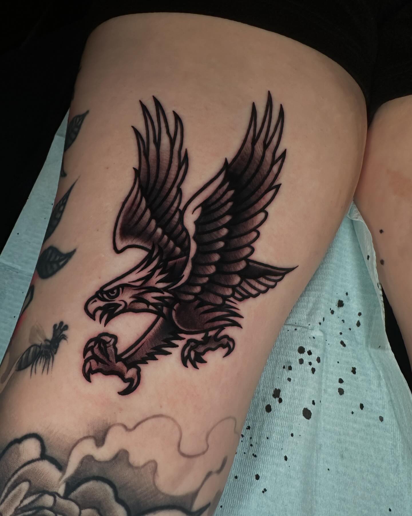Eagle black and grey tattoo on the thigh by Ryan K Severe