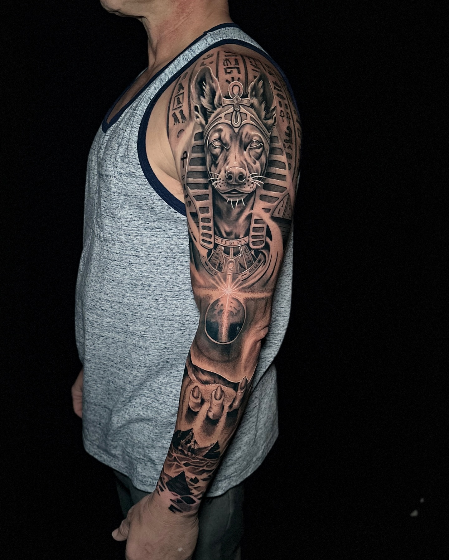 Pharaoh dog realism tattoo on the forearm by Matt Trimble, Charlotte, North Carolina