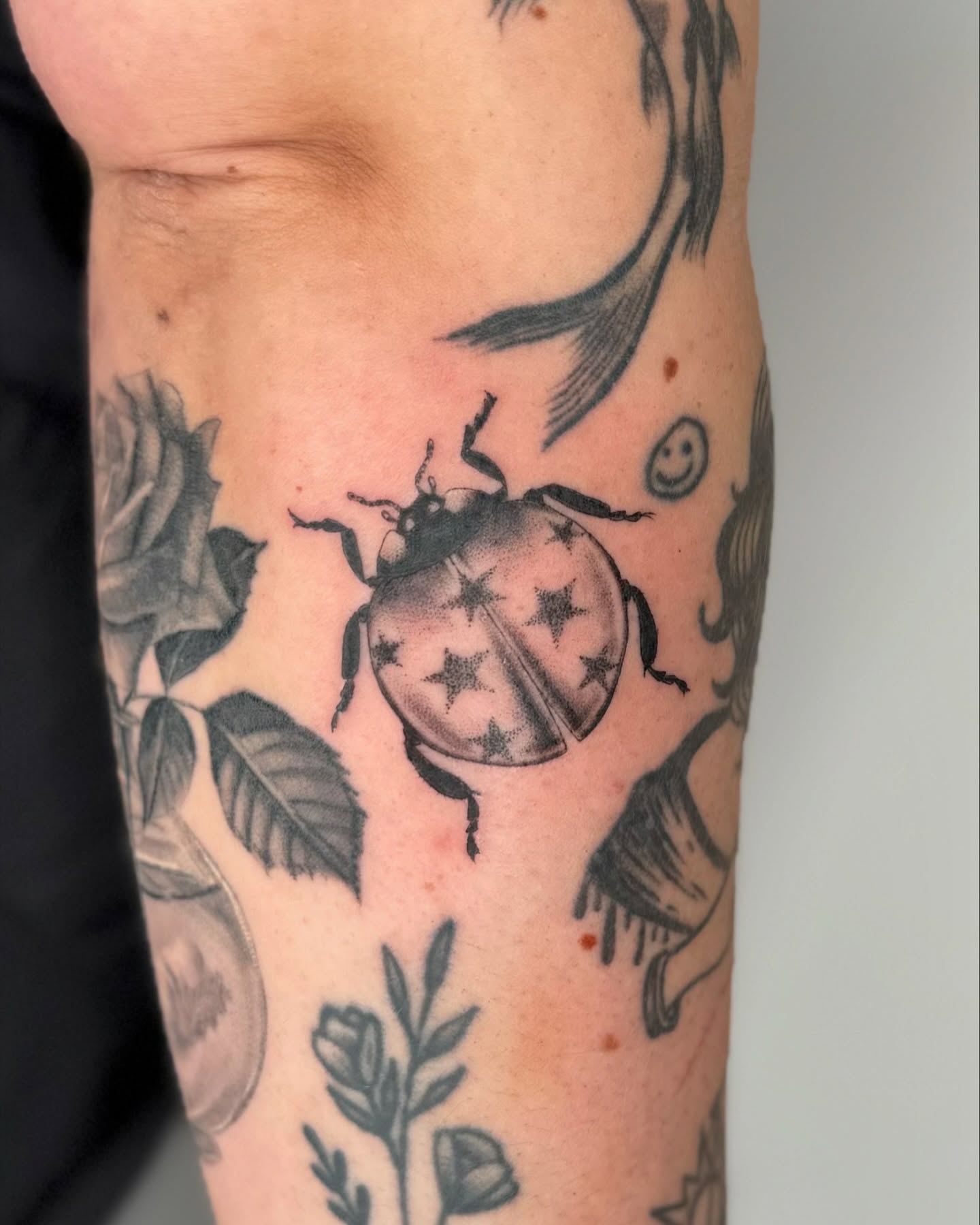 Ladybug black and grey tattoo on the forearm by ⊹ ࣪ ₊✩‧₊˚ 𝖘 𝖙 𝖊 𝖕 𝖍 𝖆 𝖓 𝖎 𝖊 ˚₊‧✩₊ ࣪ ⊹