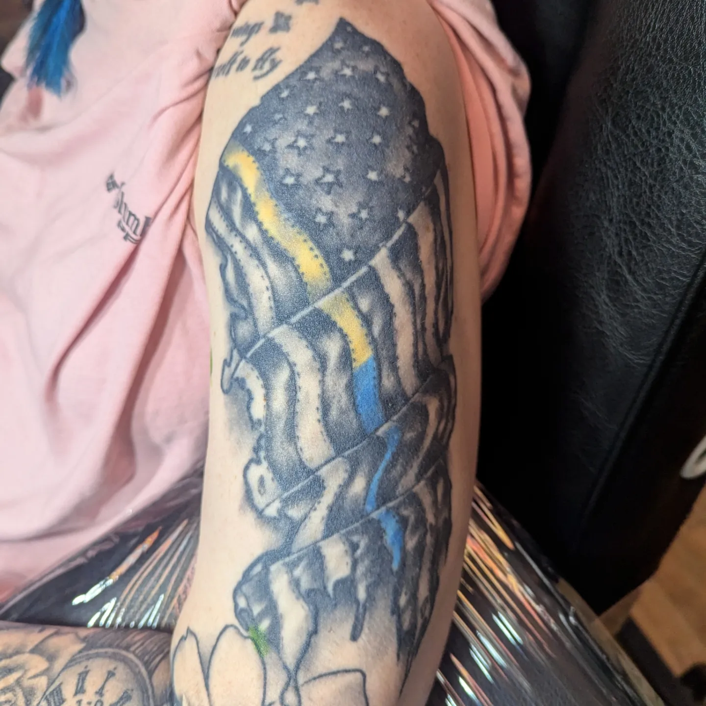 American flag American traditional tattoo on the upper arm by Bethany Jane Tattoos