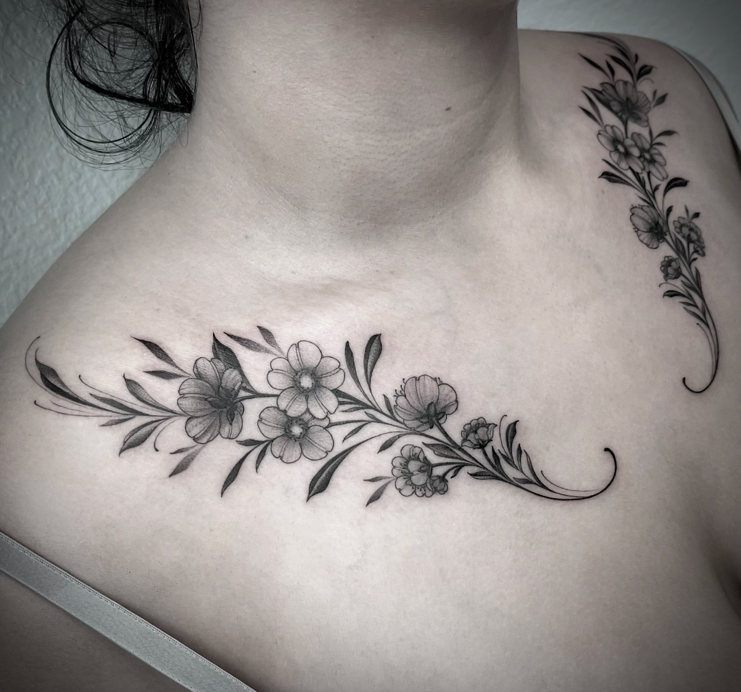 Floral vine black and grey tattoo on the chest by Martha Gual π€ East ATX Tattooer