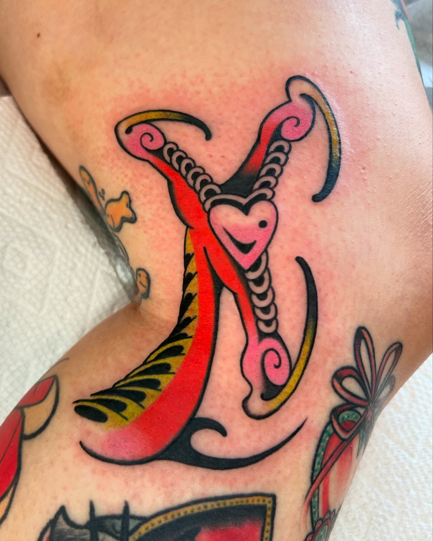 Anchor American traditional tattoo on the thigh by Lilly Binns