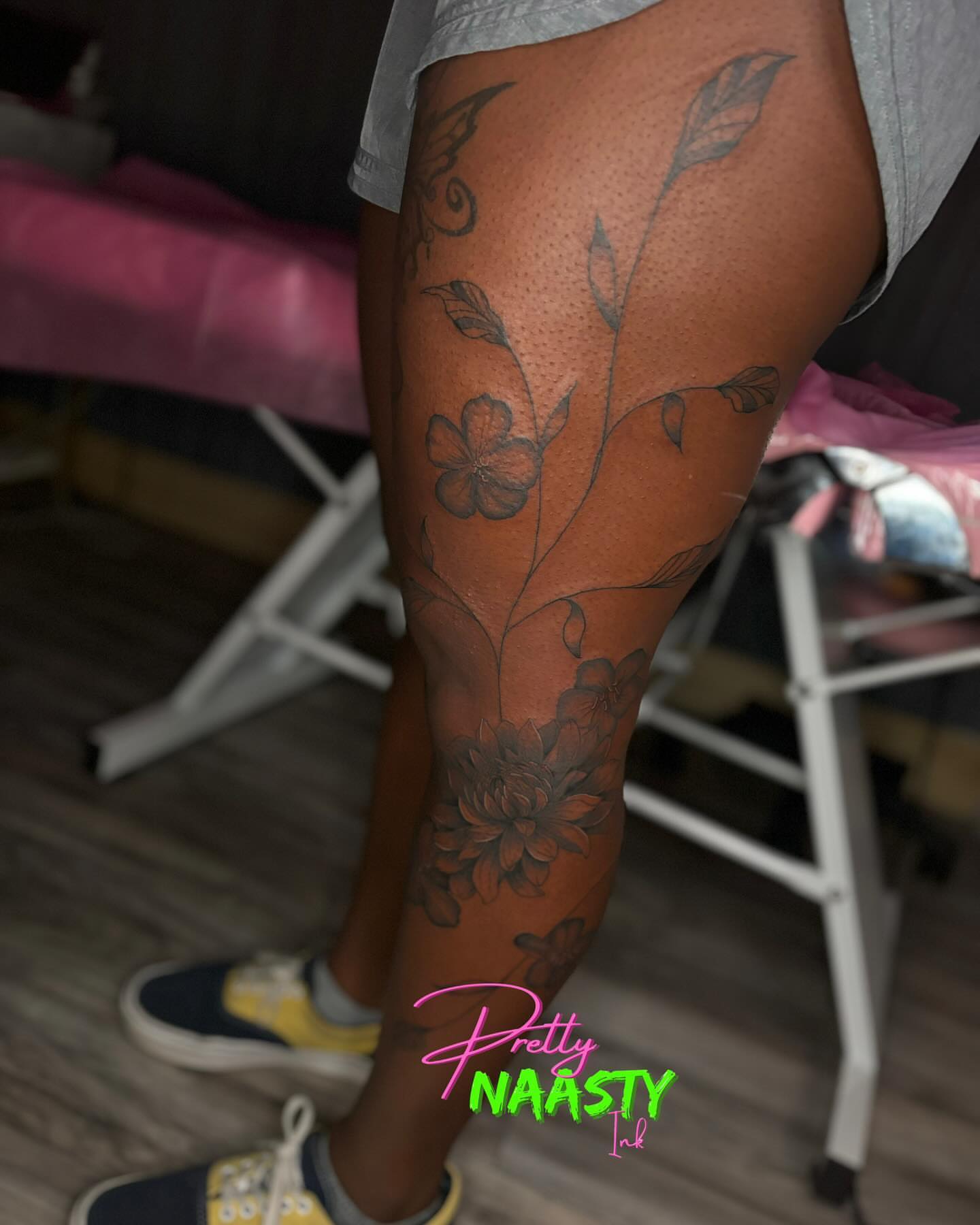 Floral design black and grey tattoo on the thigh by Pretty Naasty Ink🖤