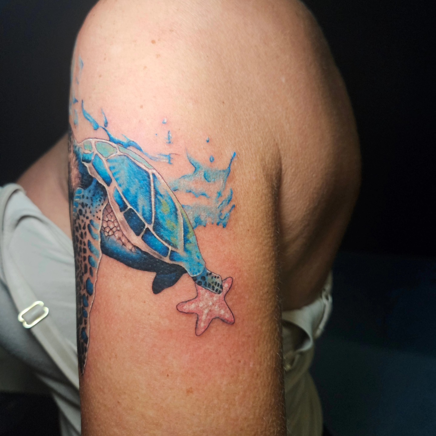 Sea turtle watercolor tattoo on the forearm by Nicole Bett