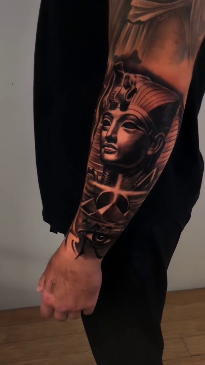 Egyptian pharaoh and Jesus Christ realism tattoo by David "Mager" Torres