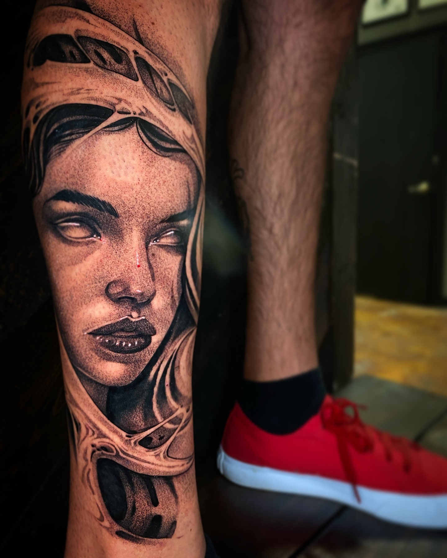 Woman's face realism tattoo on the forearm by Angel Rodriguez