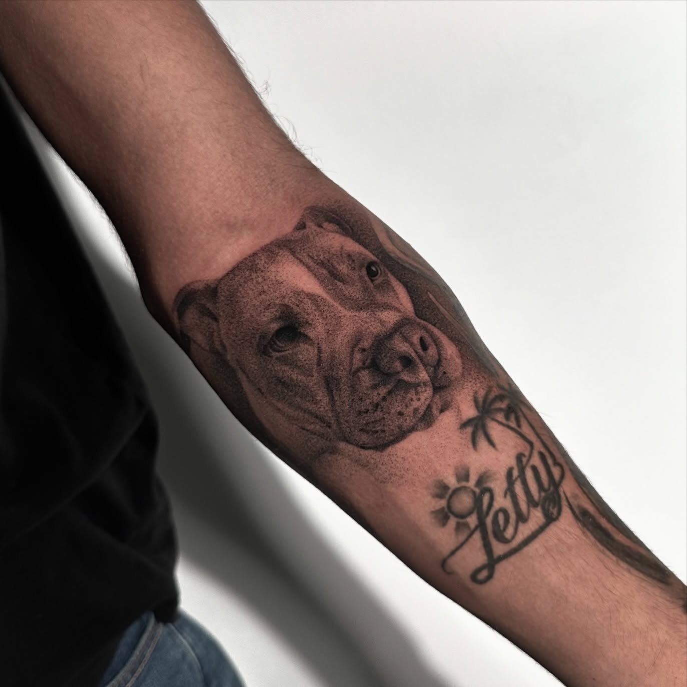 Dog dotwork tattoo on the forearm by ᴰᴿᴬᴳᴼᴺ