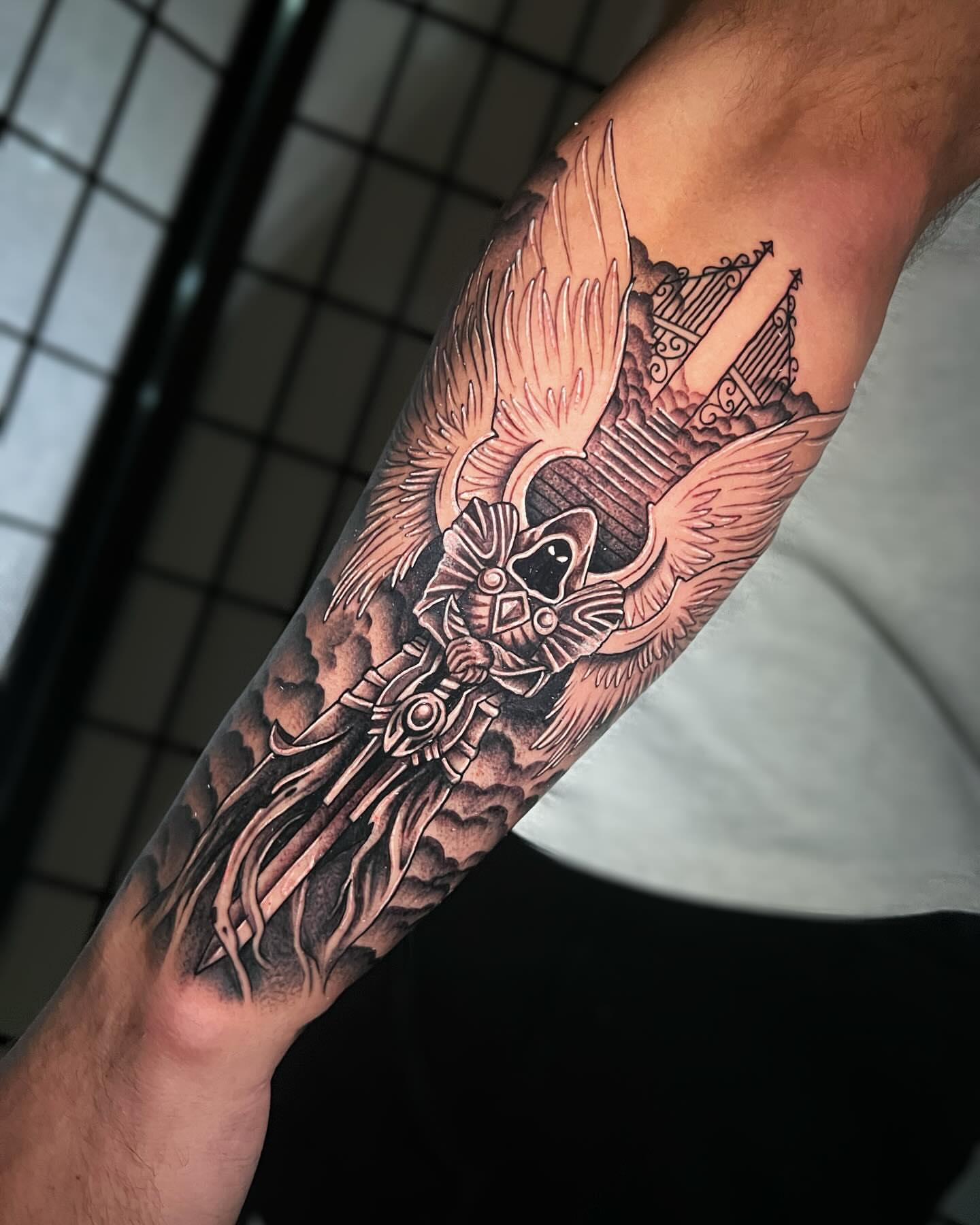 Angelic warrior realism tattoo on the forearm by Tattoo Artist