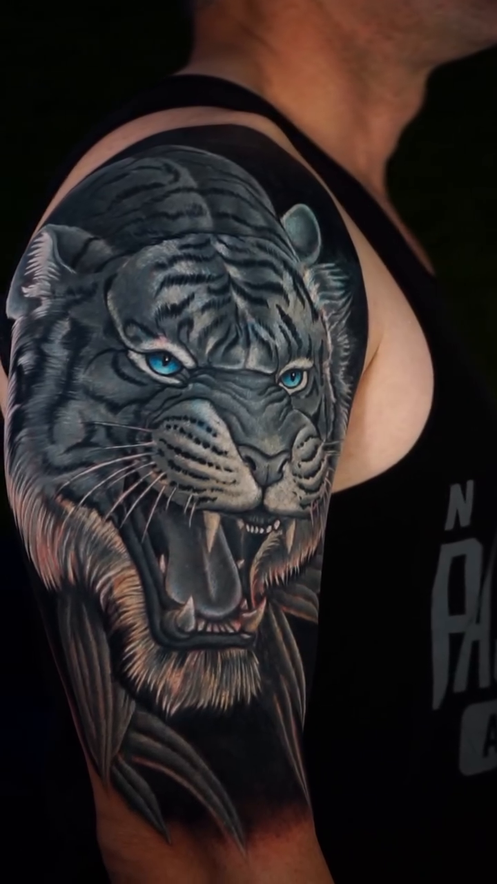 Tiger head realism tattoo by Amaury Ramirez