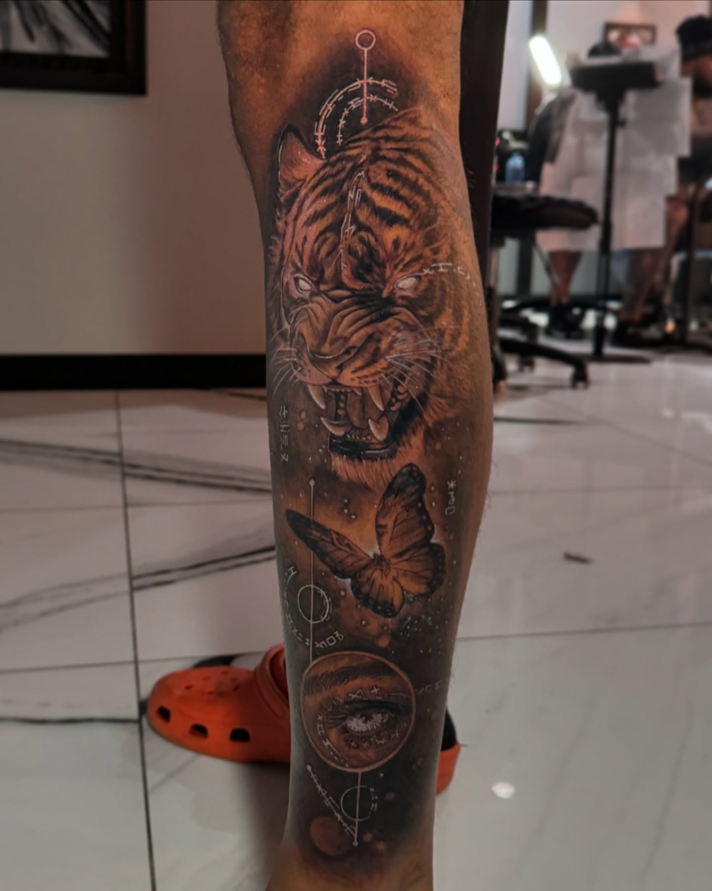 Tiger realism tattoo on the forearm by Mia