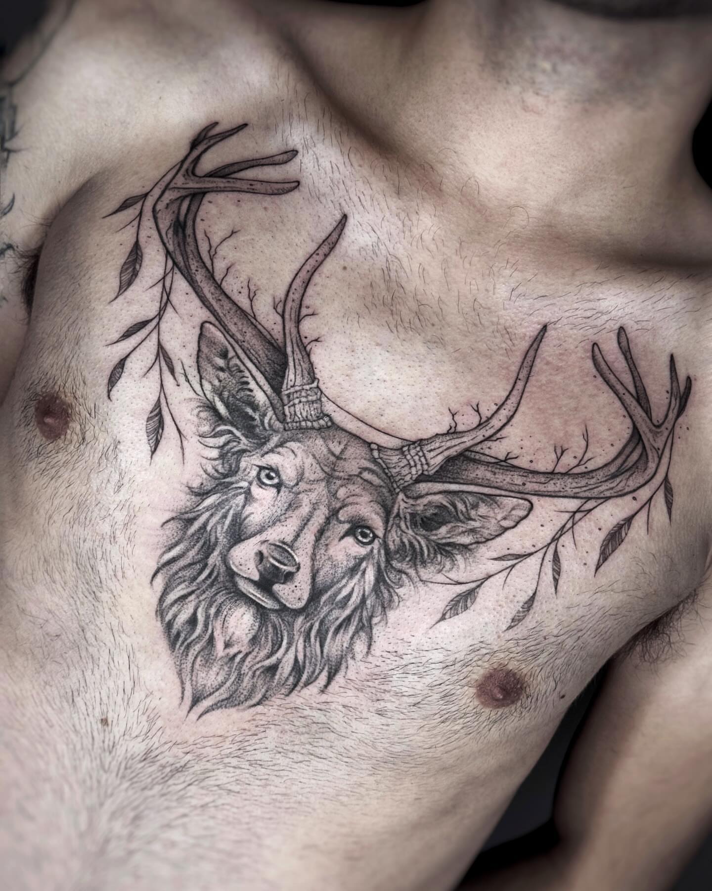 Stag head realism tattoo on the chest by Tattoo Yulia Kononenko