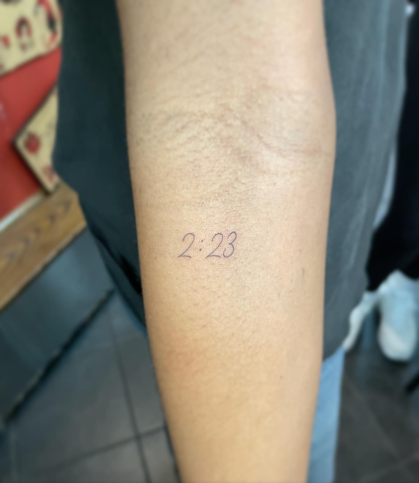 Time lettering script tattoo on the forearm by Jesus A.