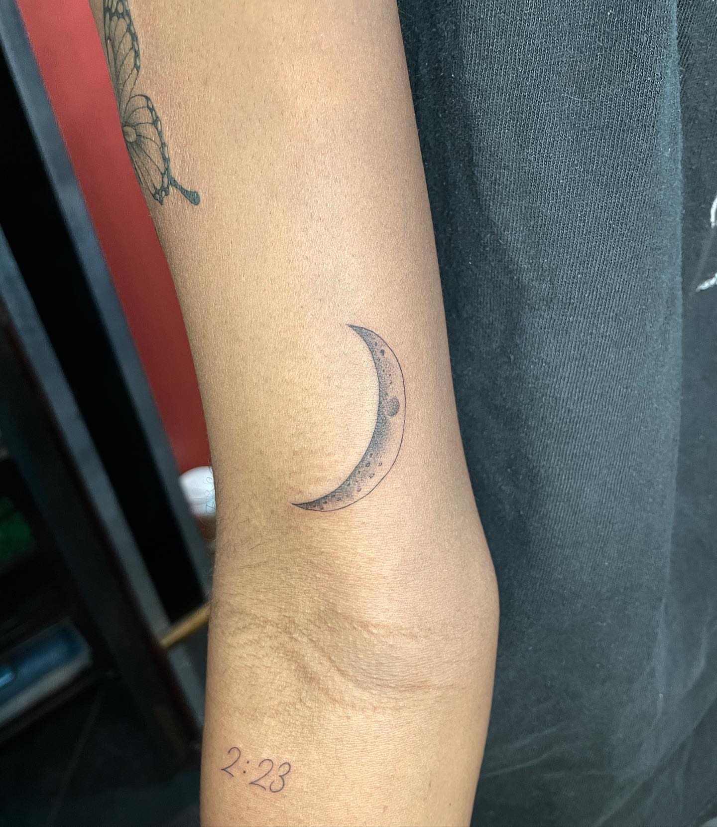 Half moon black and grey tattoo on the forearm by Jesus A.