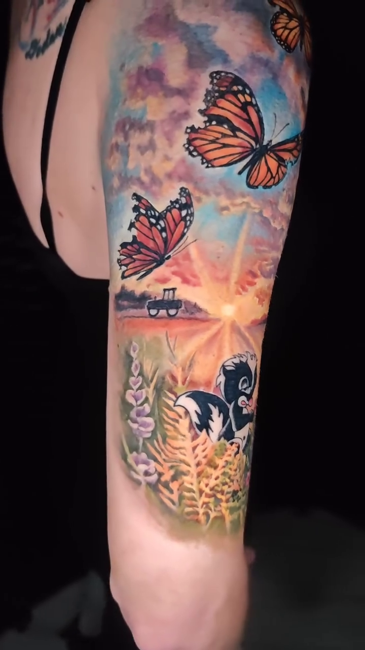 Monarch butterfly and skunk realism tattoo by Dallas Tattoo Artist Erik Espinoza