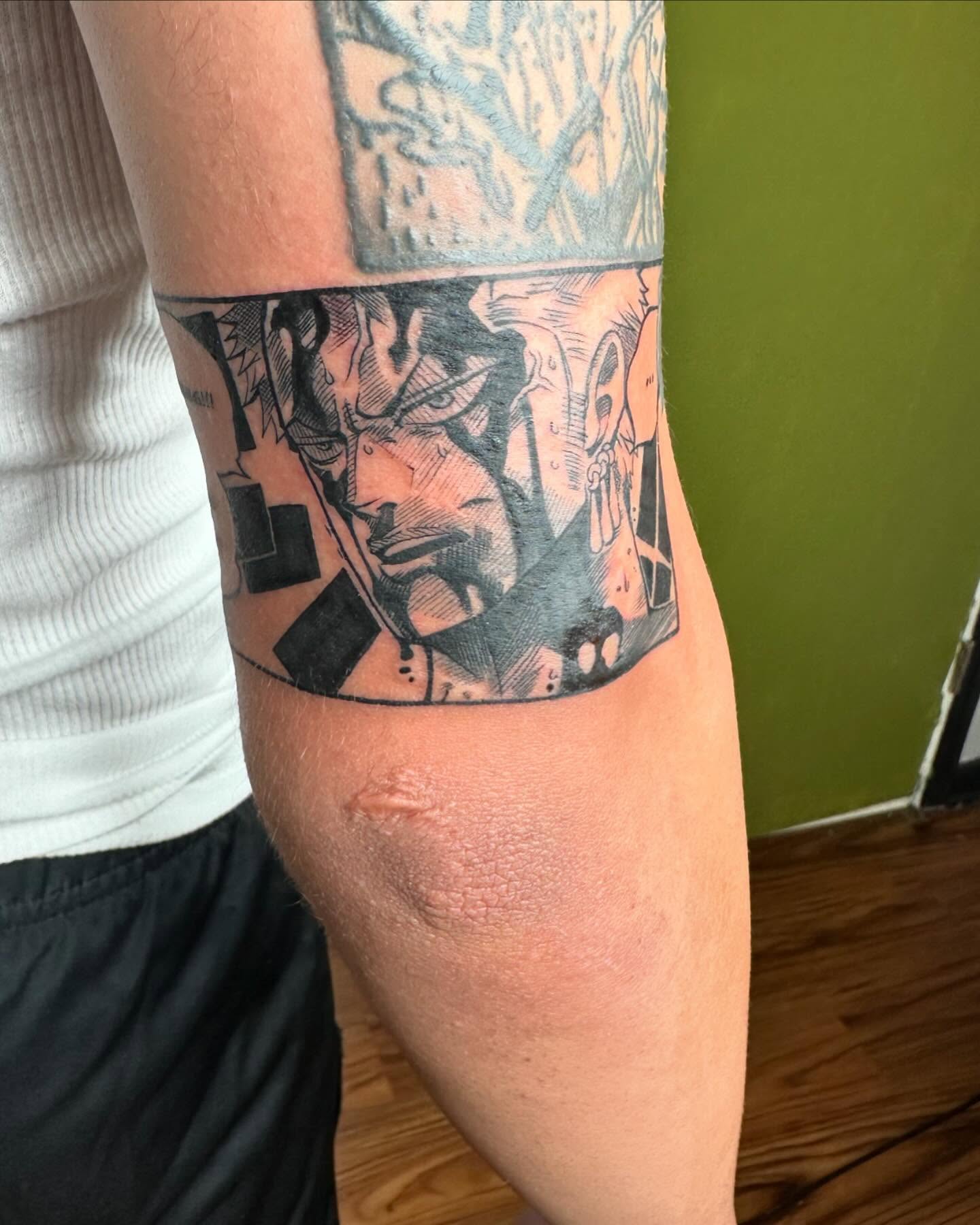 Anime character anime tattoo on the forearm by Jan Xander