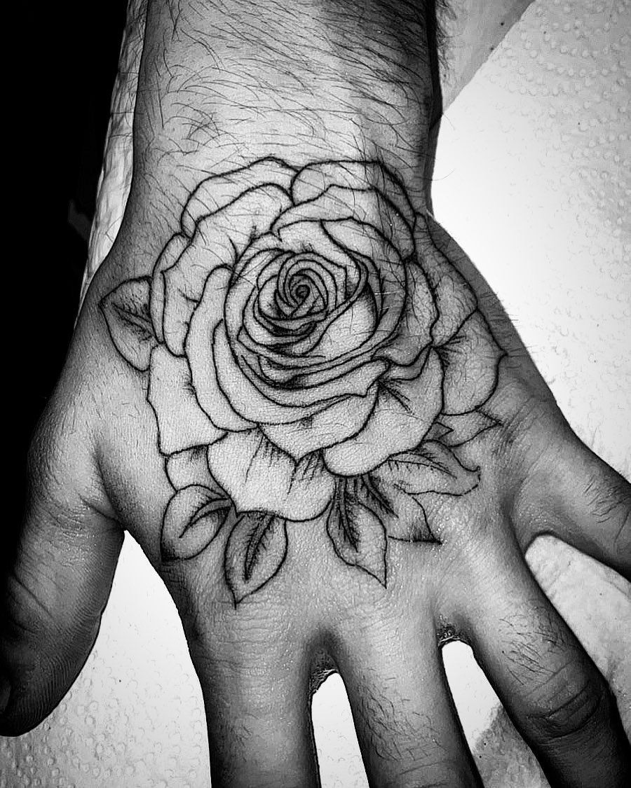 Rose on hand dotwork tattoo on the hand by Bear