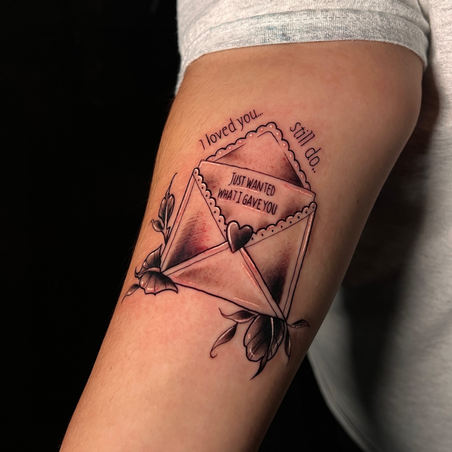 Love letter realism tattoo on the forearm by Tattoo & Body Artist, Gastonia, North Carolina