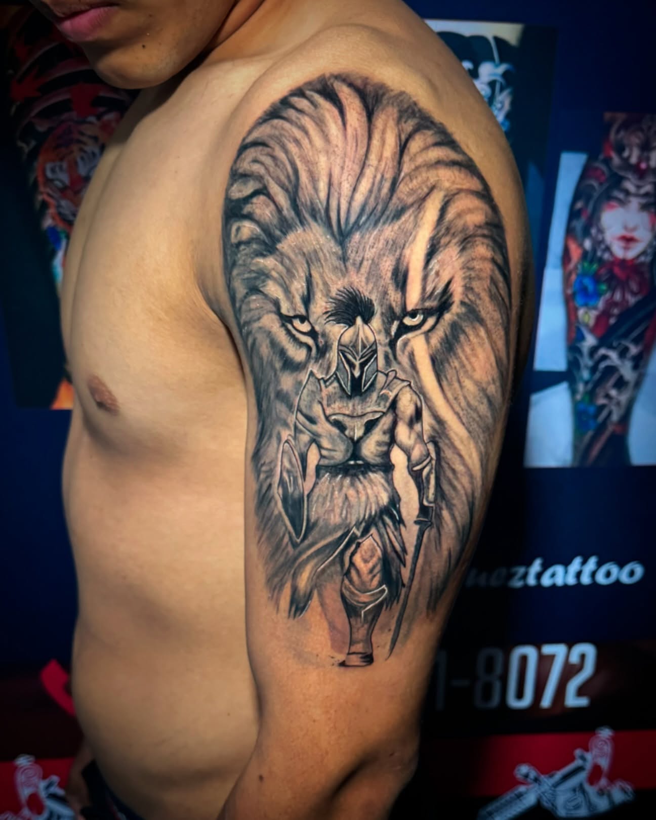 Lion realism tattoo on the shoulder by Erasmo Vasquez
