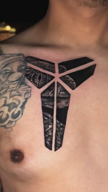 Kobe Bryant logo blackwork tattoo by David Mariscal