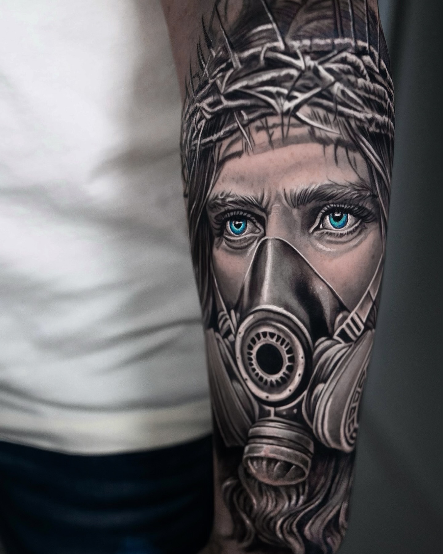 Gas mask realism tattoo on the forearm by Gabriel Garcia