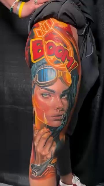 Woman with goggles and "Boom!" realism tattoo by Kevin Bradley Jr, Mesa, Arizona