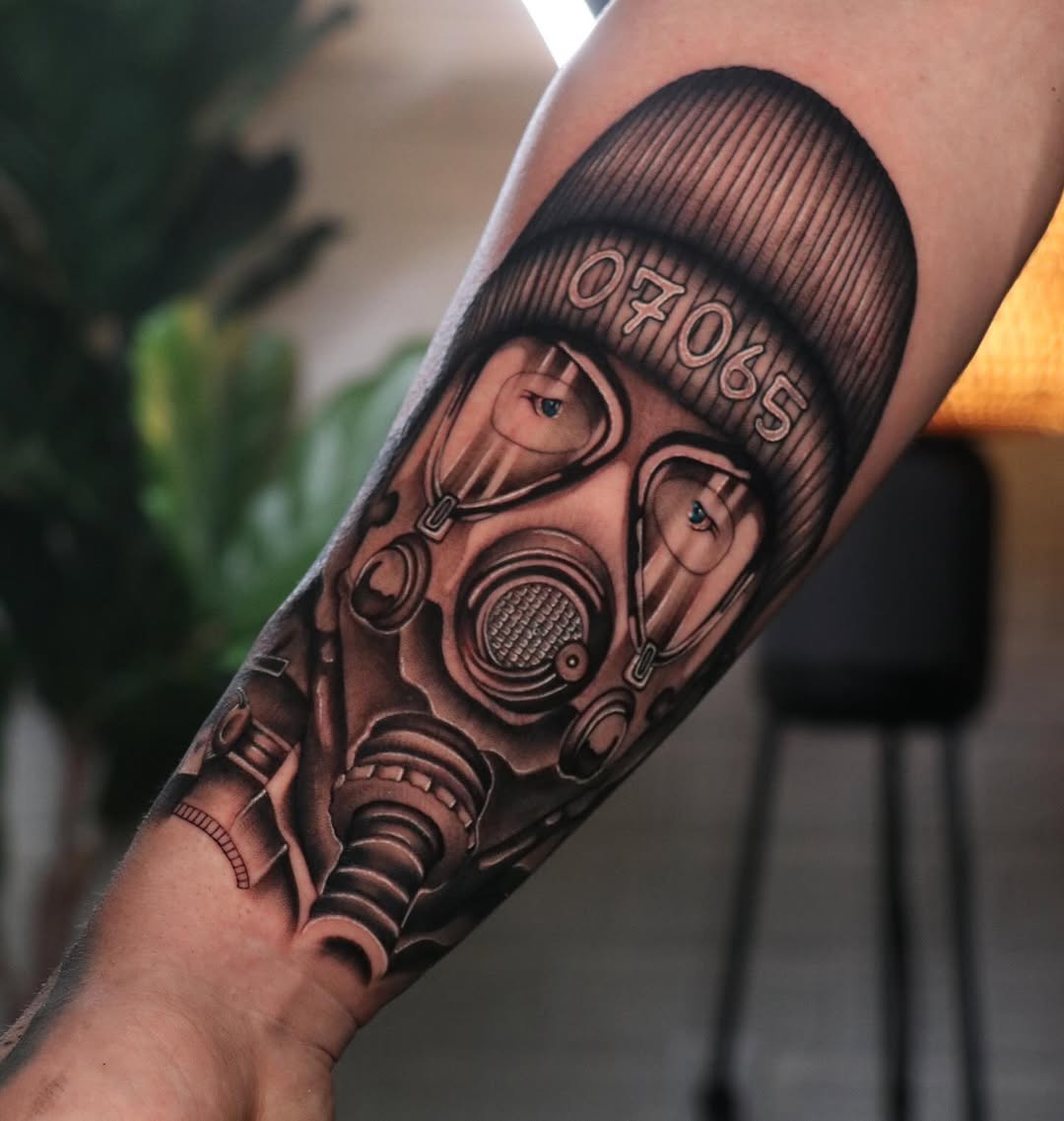 Gas mask with beanie realism tattoo on the forearm by ༺☆༻