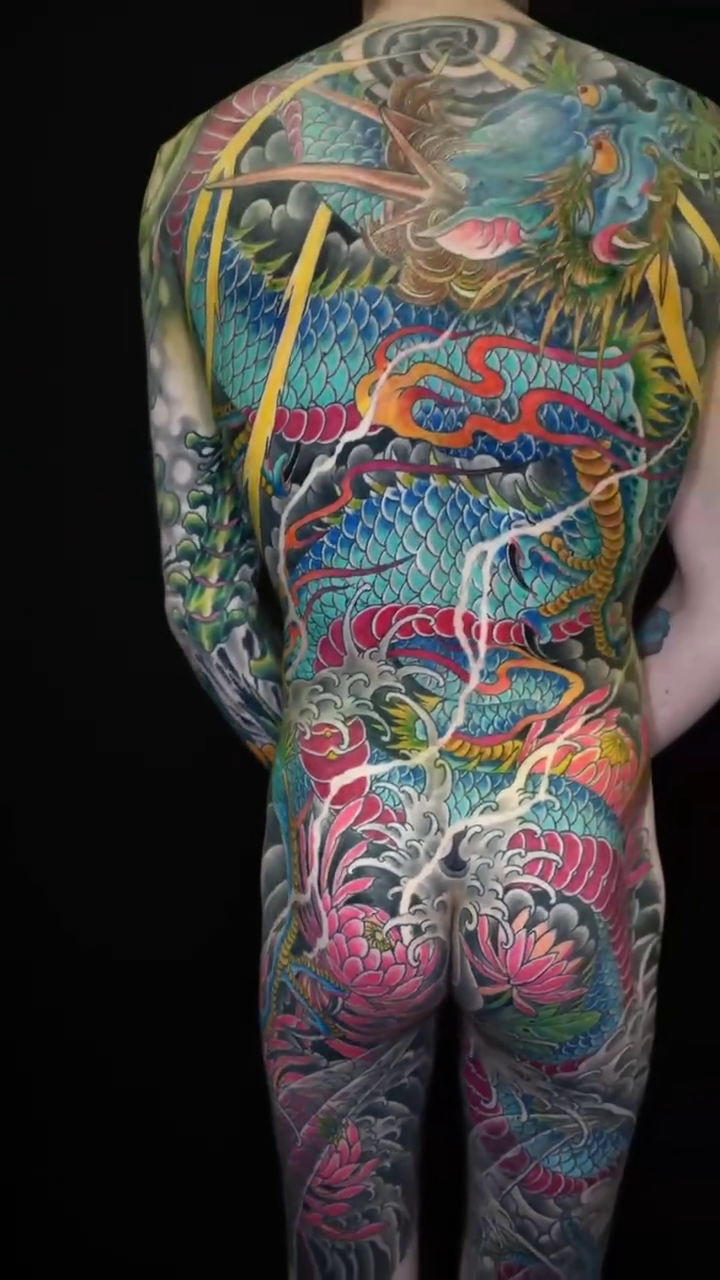 Dragon and lotus flowers japanese irezumi tattoo by James Vaughn