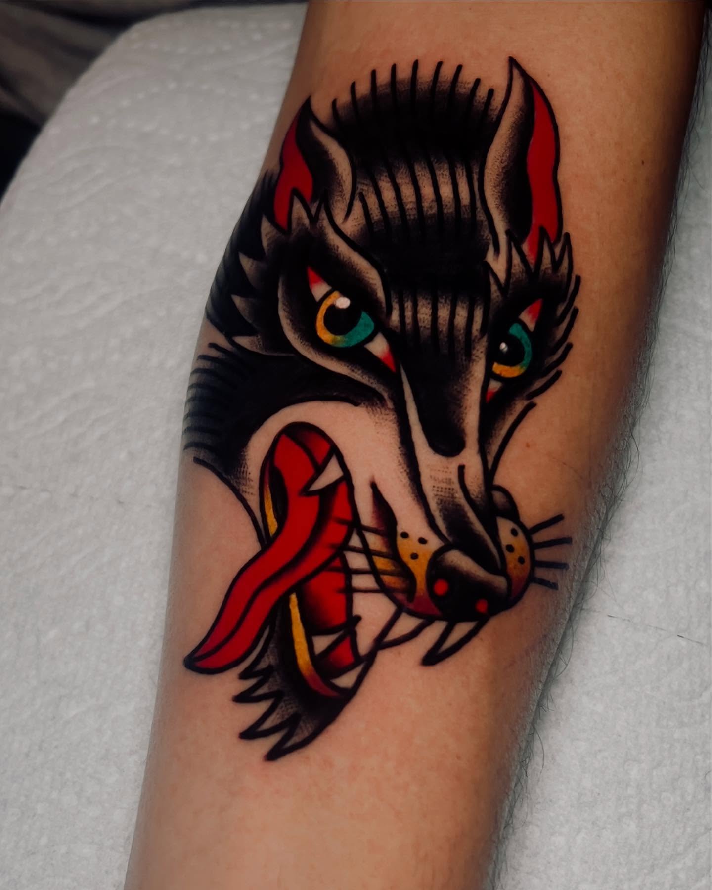 Wolf American traditional tattoo on the forearm by ReadyFreddie_tattoo