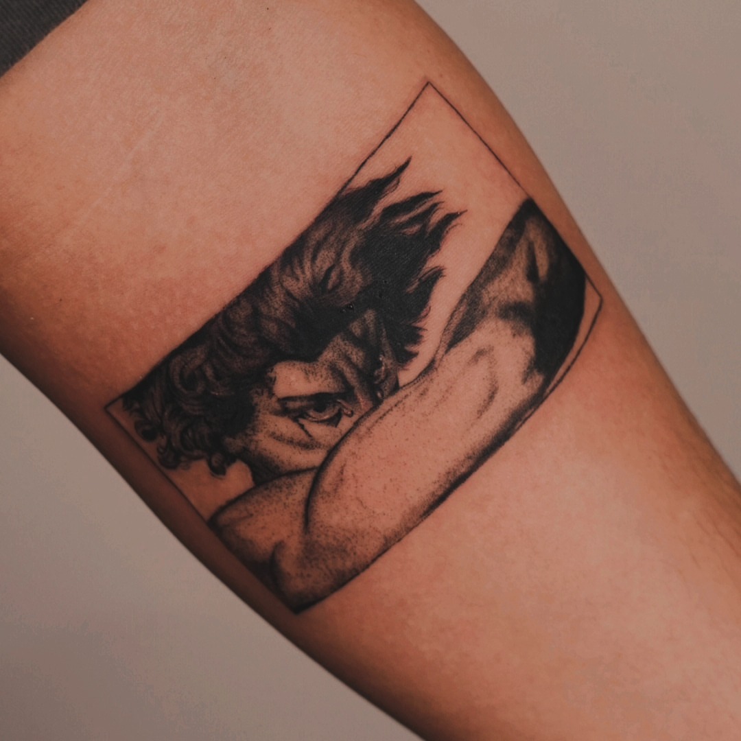 Man with tousled hair dotwork tattoo on the forearm by Johnathan Nguyen