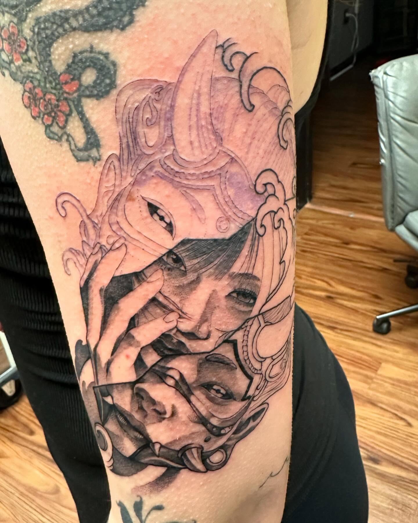 Woman with octopus realism tattoo on the forearm by Jan Xander