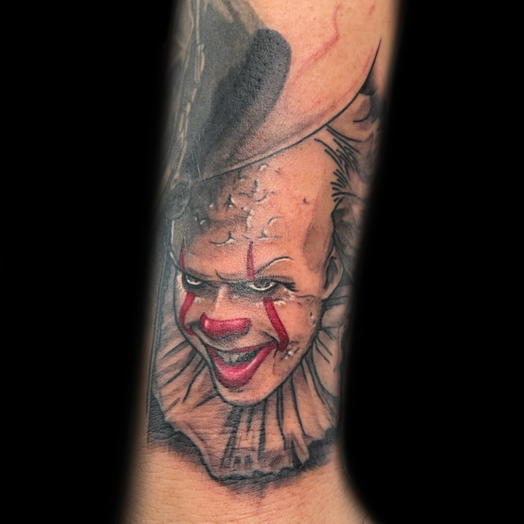 Clown realism tattoo on the forearm by Will Eagle