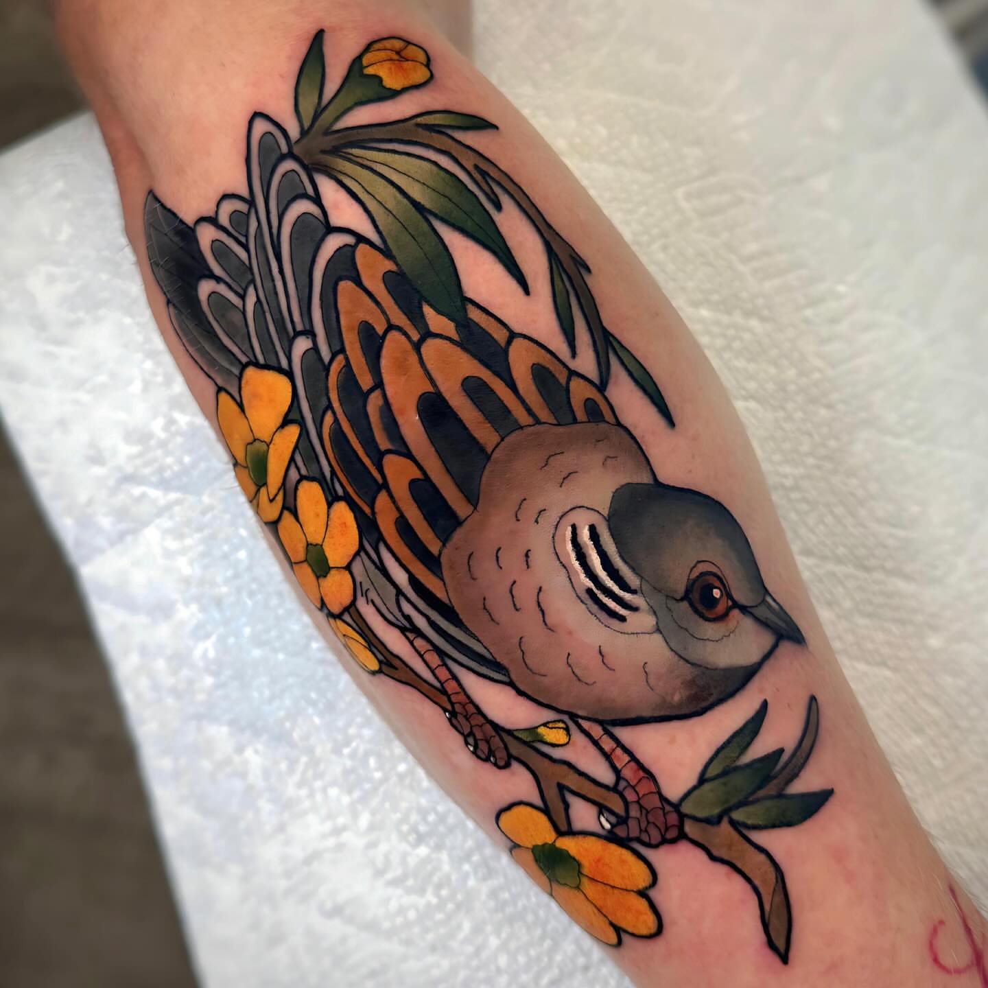 Bird and flowers American traditional tattoo on the forearm by ๐ ๐ต๐๐๐๐๐ ๐ฎ๐๐๐๐๐๐๐๐๐