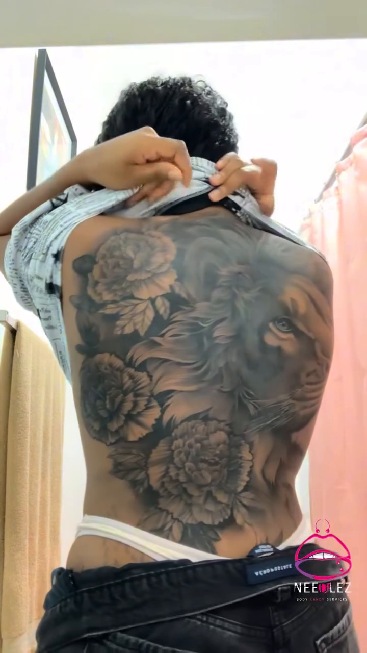 Rose and floral arrangement realism tattoo by Anwon Johnson