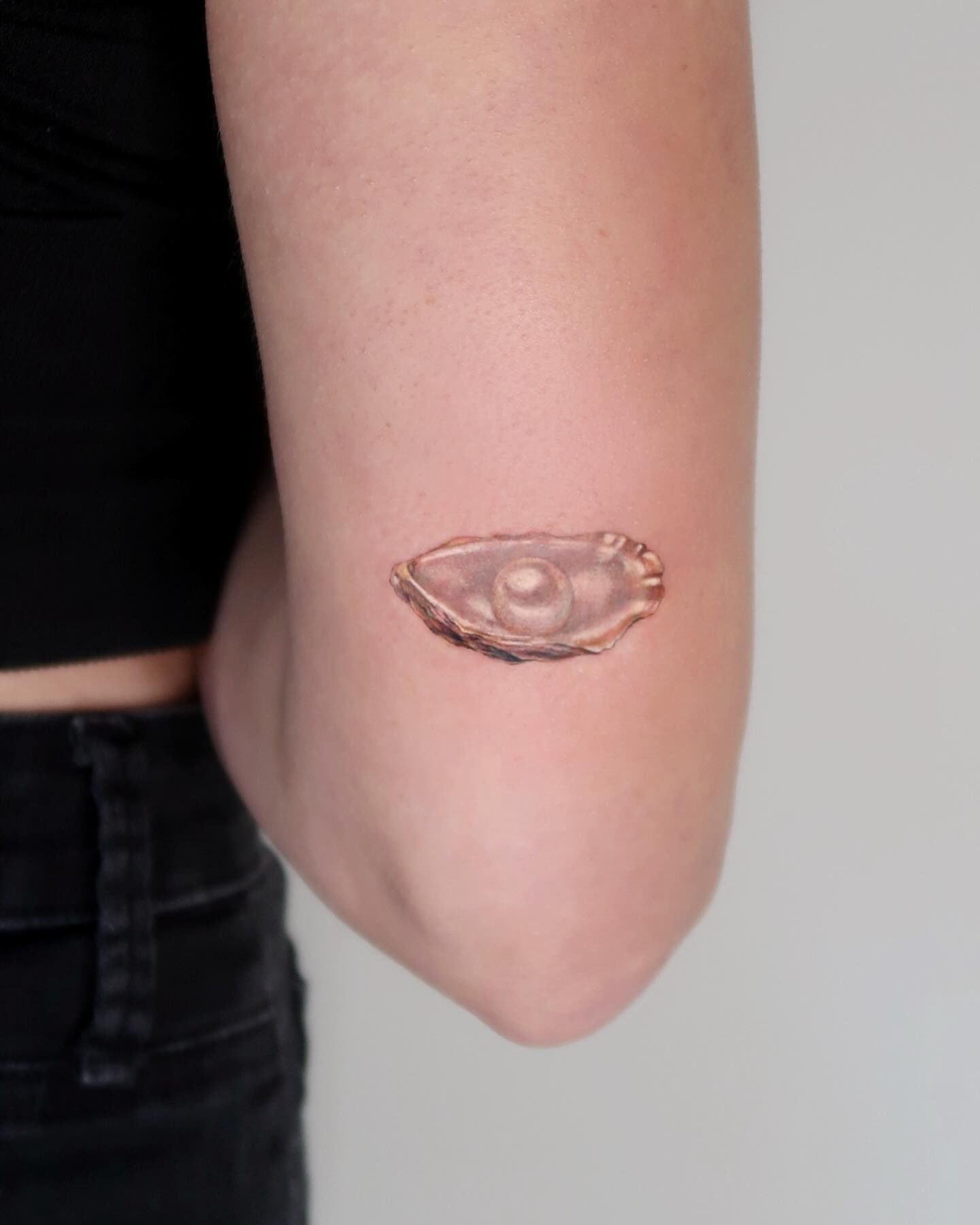 Eye realism tattoo on the forearm by Alissa Jung