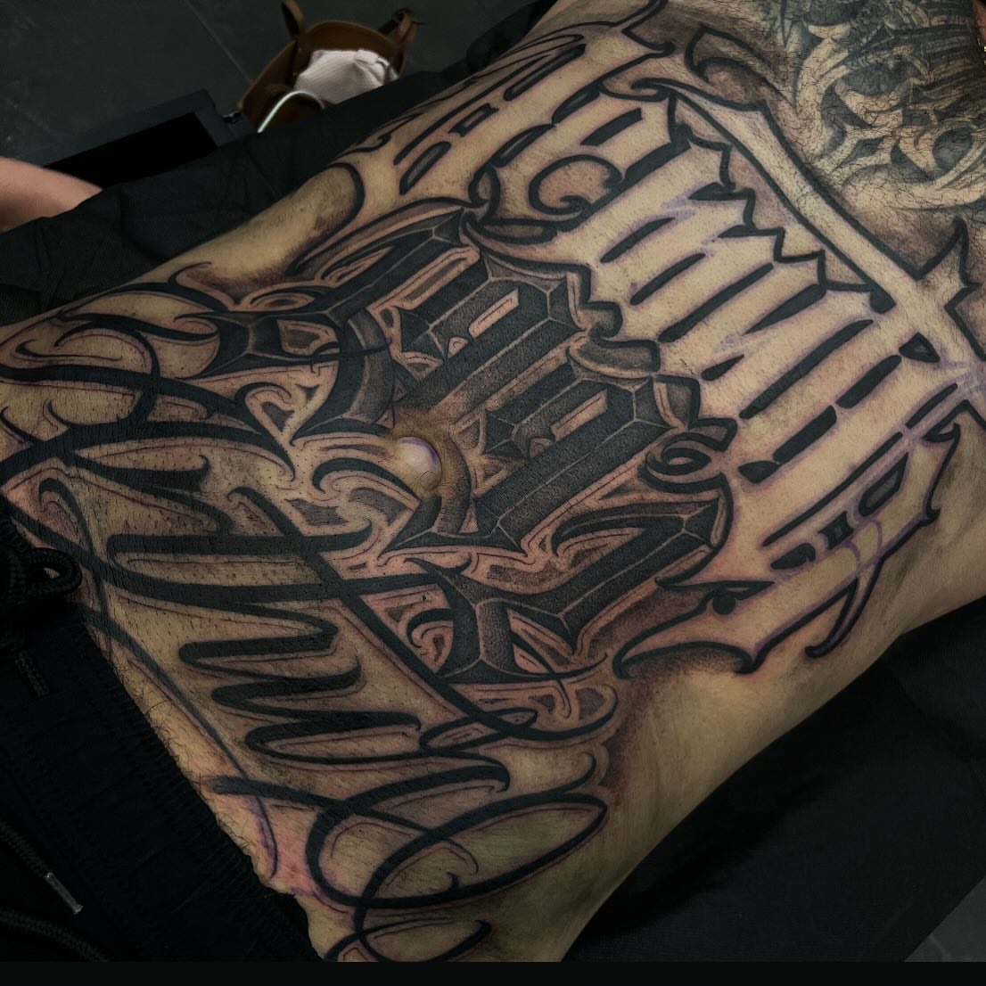 Geometric geometric tattoo on the thigh by Chicanocustomlettering