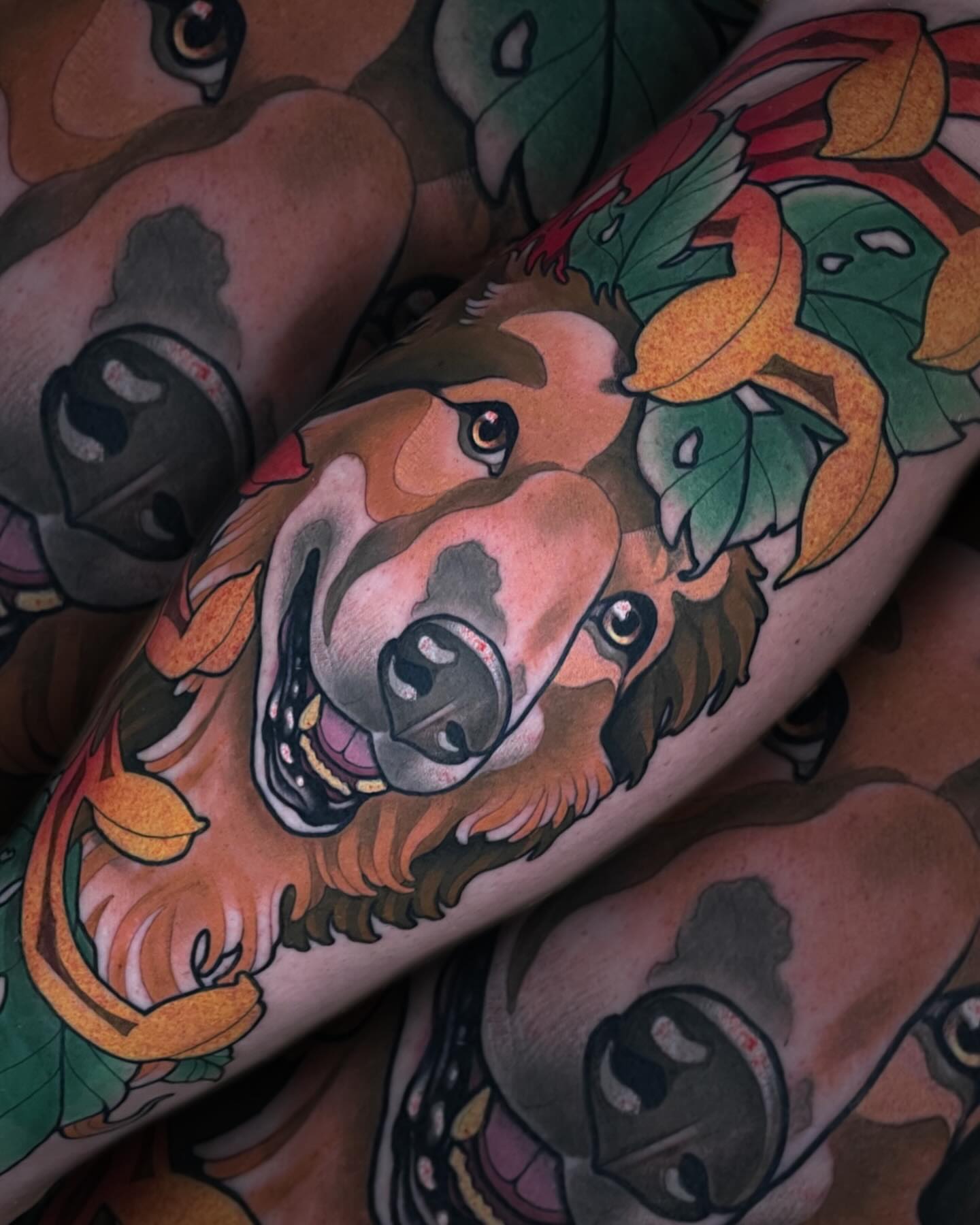 Dog with leaves American traditional tattoo on the forearm by Nathan Mickle