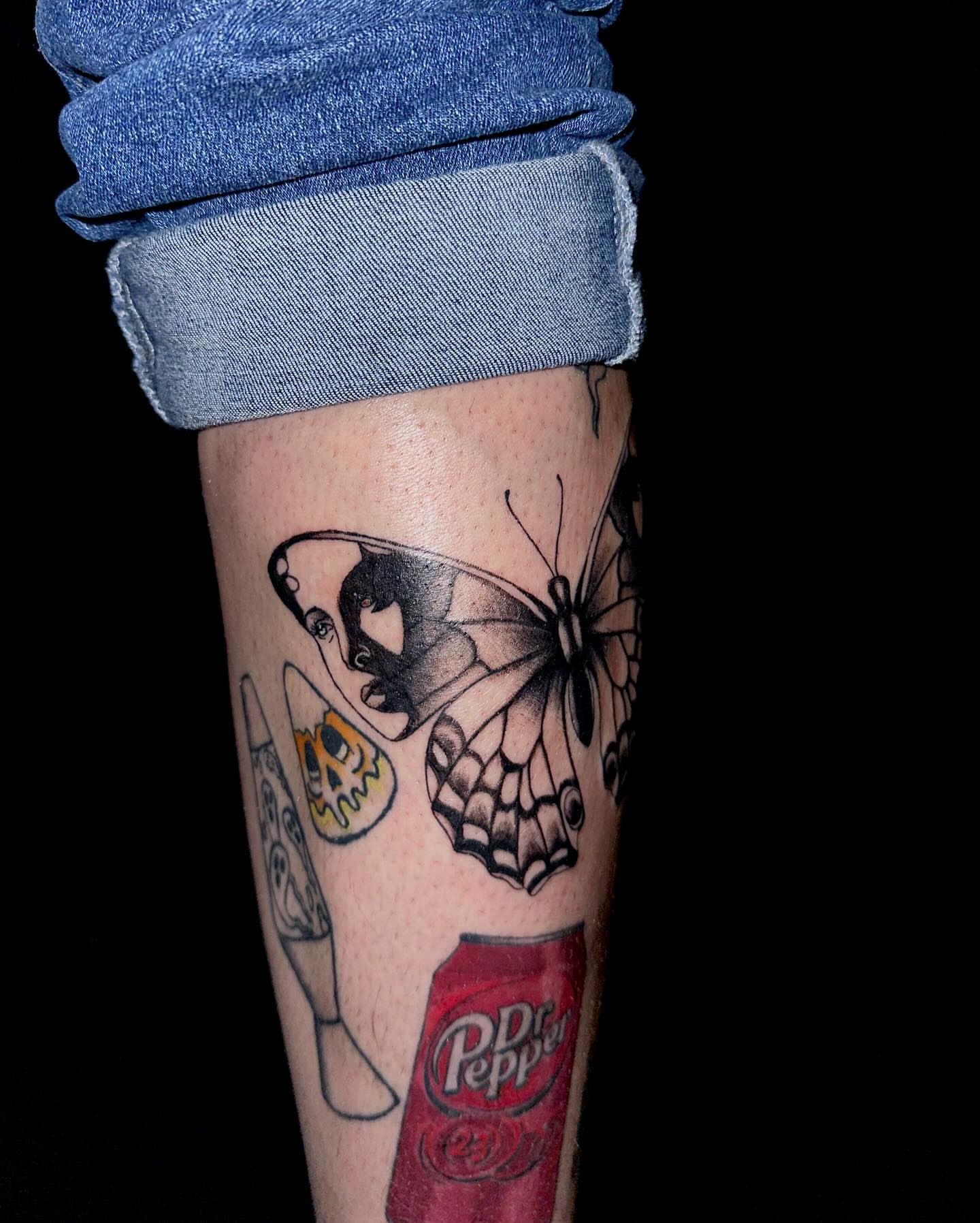 Butterfly black and grey tattoo on the forearm by Marie Novotny, Lakewood, Ohio