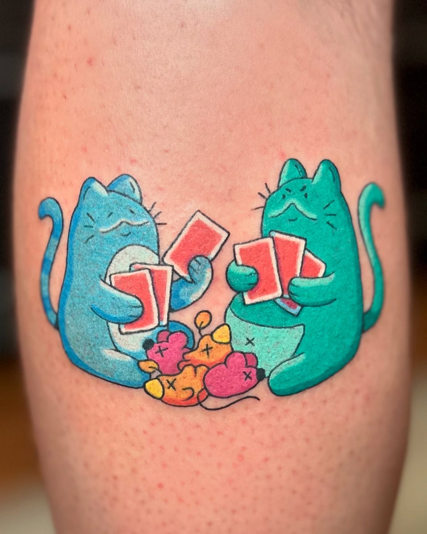 Playing cats illustrative tattoo on the thigh by Kellie Burch
