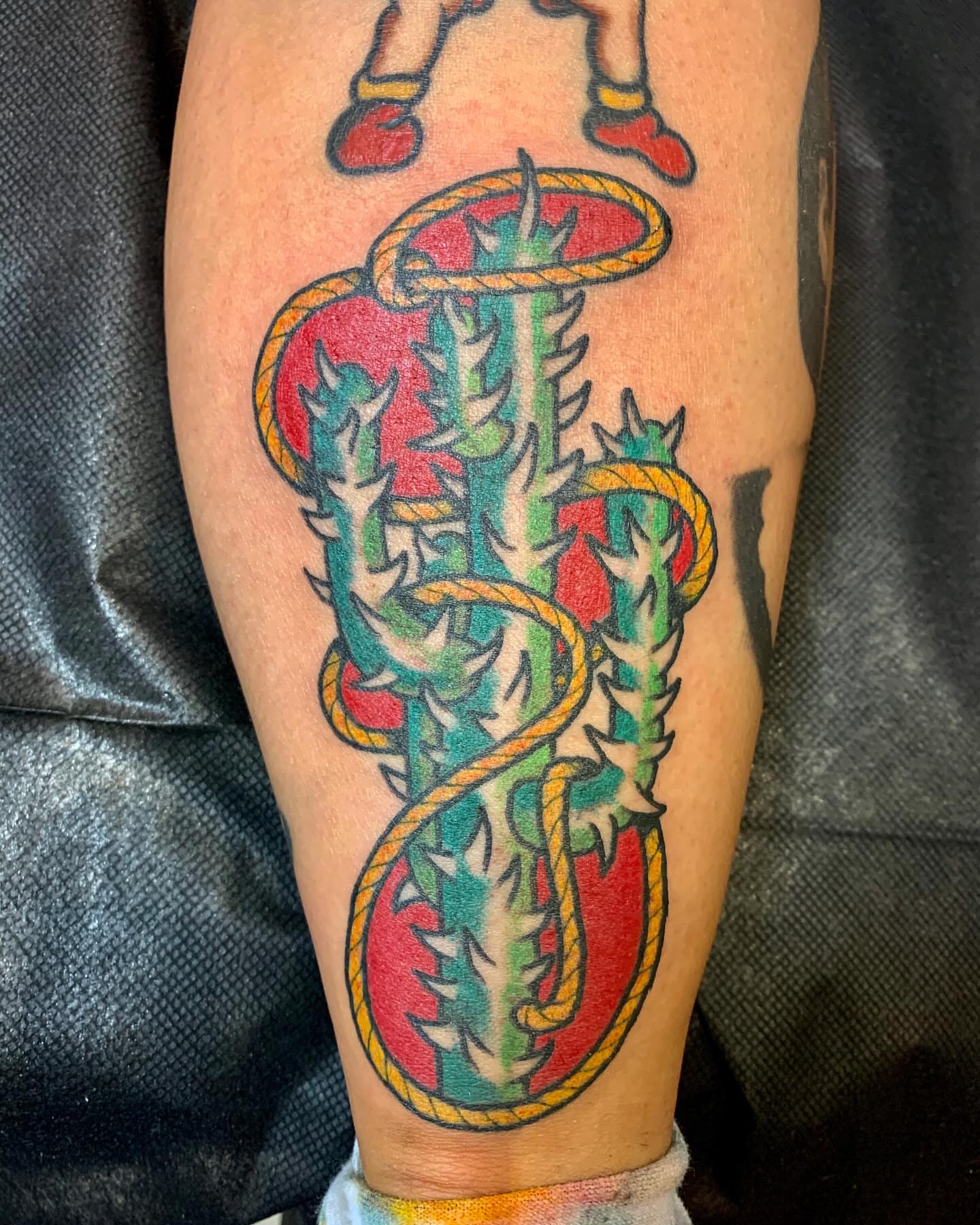 Rope and thorns American traditional tattoo on the calf by Nick Rodin