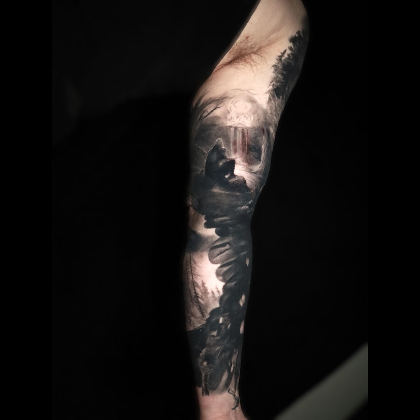 Forest waterfall realism tattoo on the forearm by Mike j tattooer