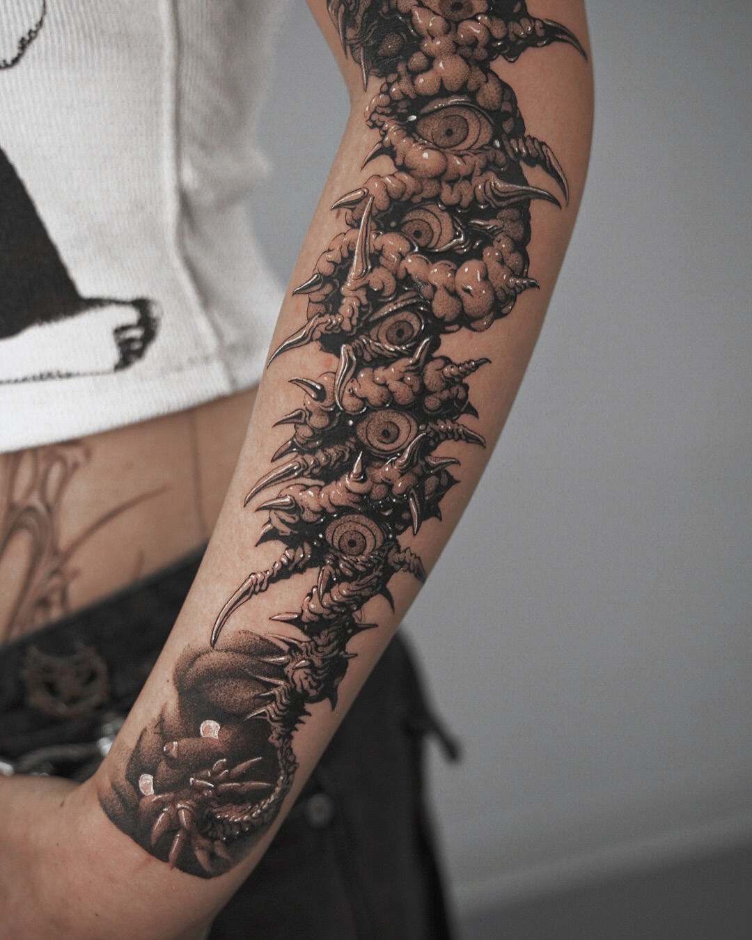 Tattoo by @nowthisyujhi — black_and_grey, dark_realism